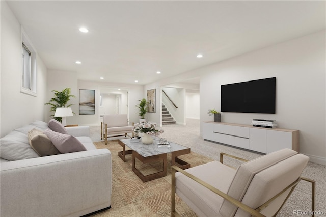 living area with stairs, light colored carpet, and recessed lighting