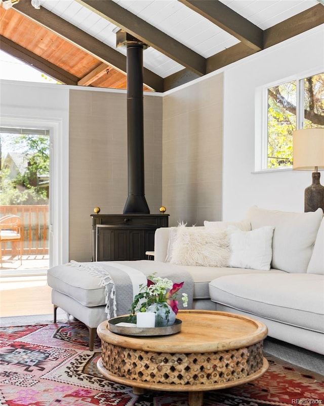 living room featuring a wood stove