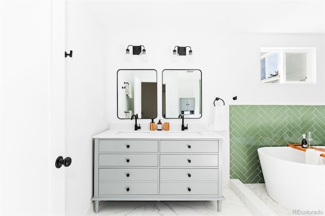 full bathroom featuring marble look tile flooring, double vanity, a soaking tub, and tile walls