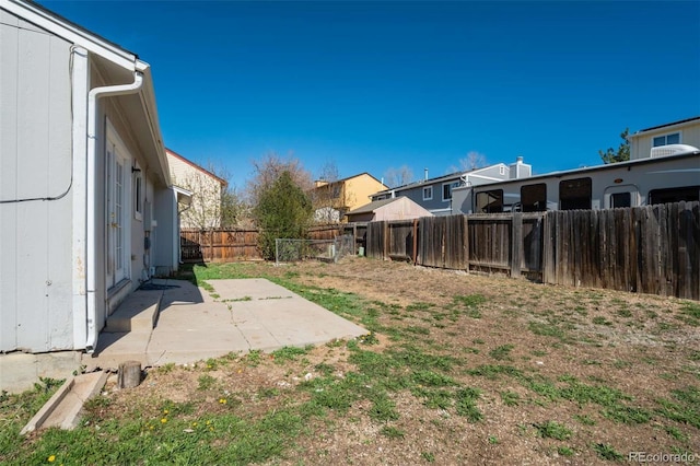 view of yard featuring a fenced backyard and a patio