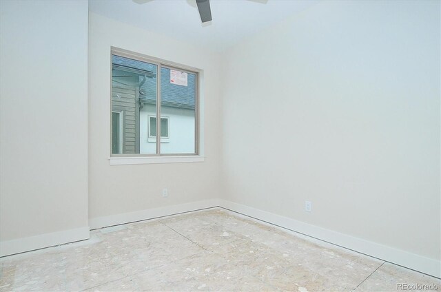 empty room featuring ceiling fan