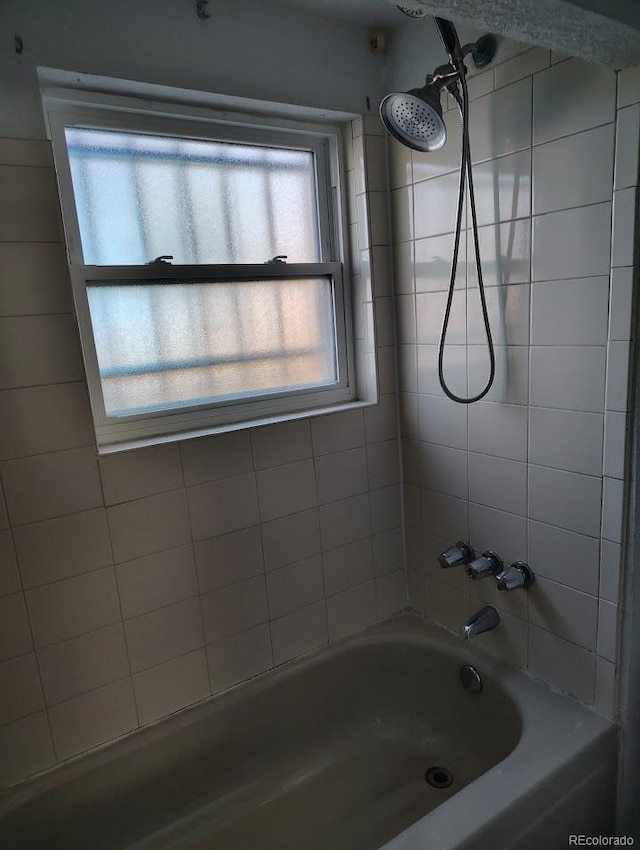 bathroom featuring bathtub / shower combination