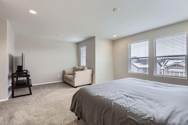 bedroom featuring light colored carpet