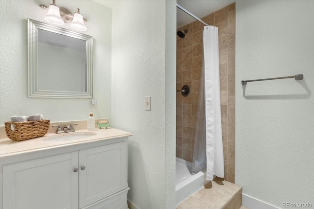 bathroom with vanity and a shower with curtain