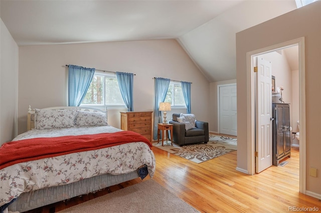 753 Edge Hill Dr, Woodland Park, CO 80863 - bedroom featuring wood finished floors and lofted ceiling