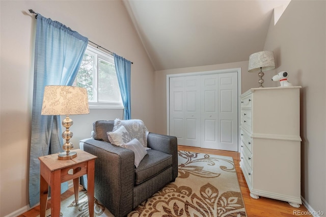 753 Edge Hill Dr, Woodland Park, CO 80863 - sitting room with vaulted ceiling and light wood finished floors