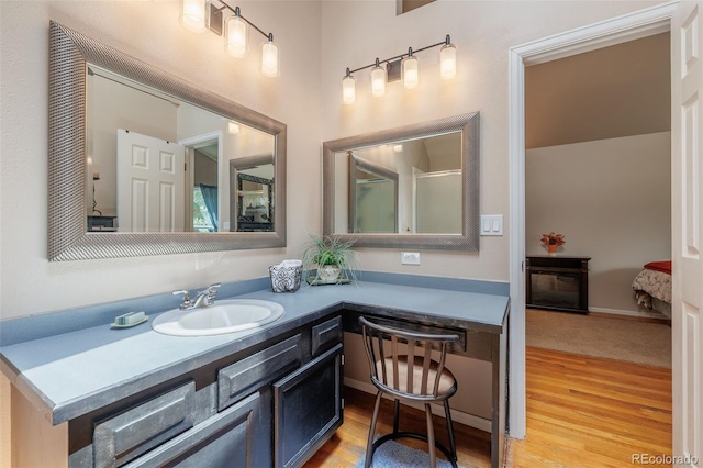 753 Edge Hill Dr, Woodland Park, CO 80863 - bathroom with vanity and wood finished floors
