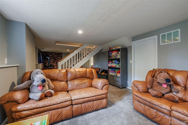 753 Edge Hill Dr, Woodland Park, CO 80863 - living area featuring carpet, a textured ceiling, stairway, and recessed lighting