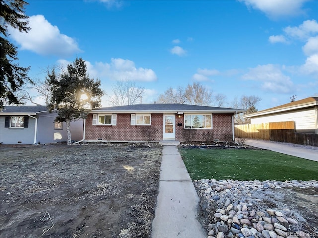 ranch-style house with a front yard