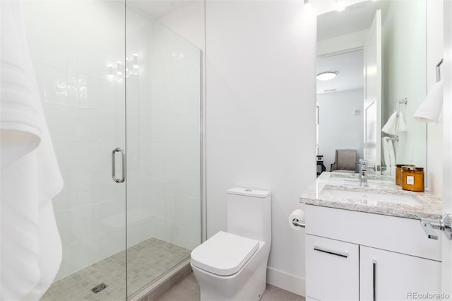 full bathroom with vanity, toilet, baseboards, and a shower stall