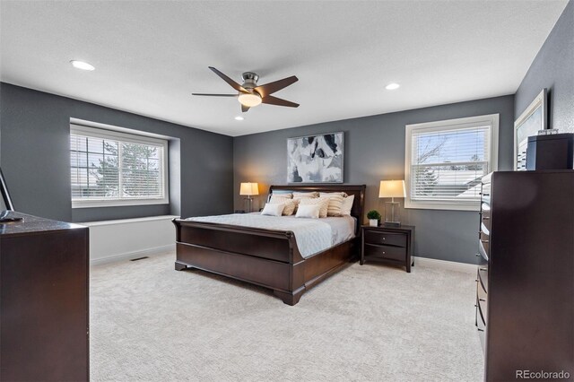 bedroom with ceiling fan, recessed lighting, carpet flooring, and baseboards