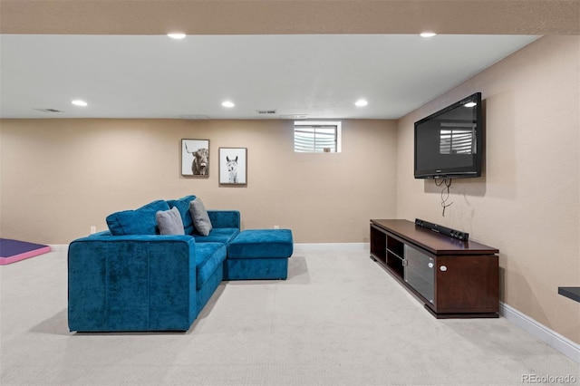 living area with carpet, baseboards, and recessed lighting