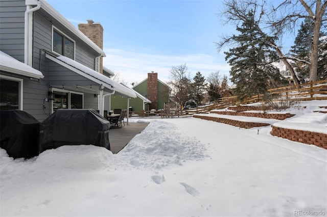 view of yard covered in snow