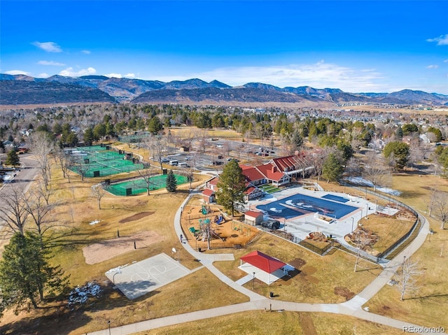 birds eye view of property featuring a mountain view