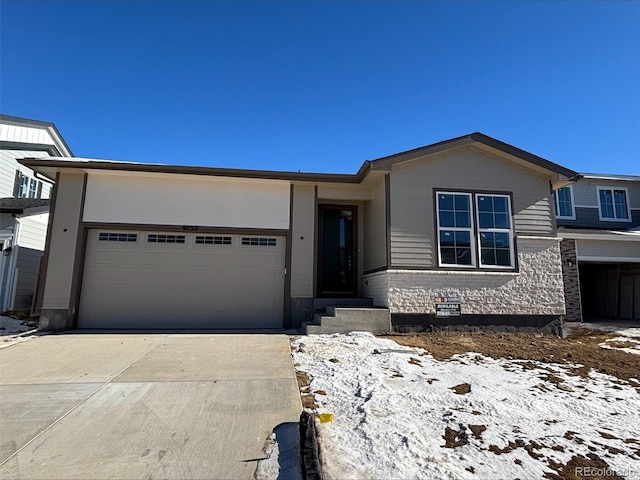 view of front of property with a garage