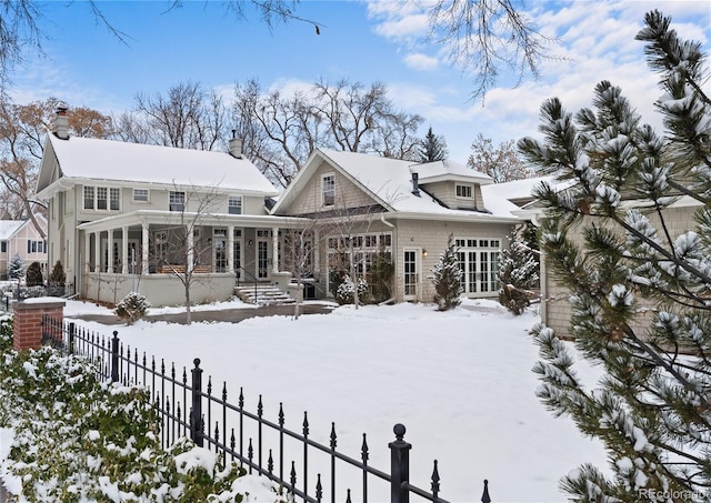 view of snow covered property