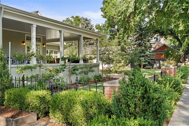 exterior space featuring covered porch