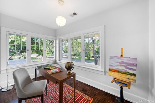 office featuring visible vents and baseboards