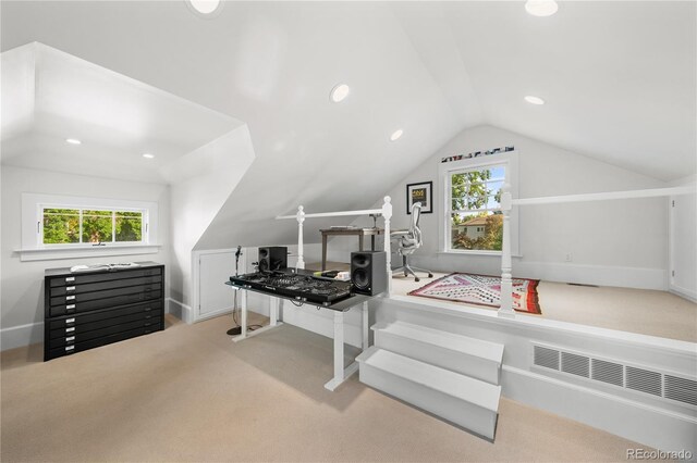 office with recessed lighting, vaulted ceiling, and light colored carpet