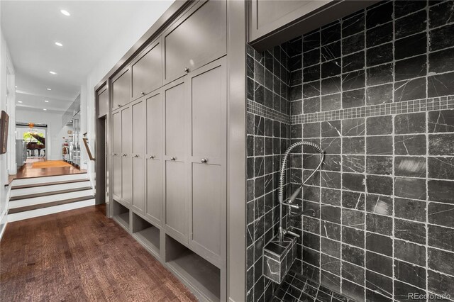 mudroom with dark wood-type flooring and recessed lighting