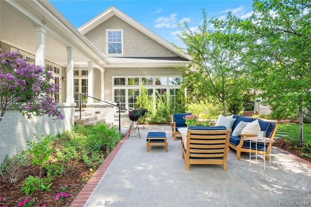 view of patio / terrace with outdoor lounge area and french doors