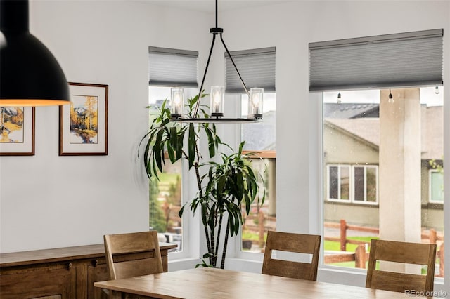 4465 Mesa Top Dr, Monument, CO 80132 - dining space with healthy amount of natural light
