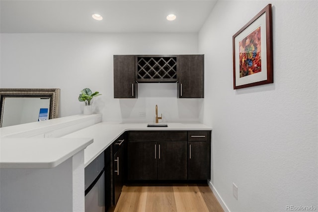 4465 Mesa Top Dr, Monument, CO 80132 - indoor wet bar with light wood-style flooring and recessed lighting