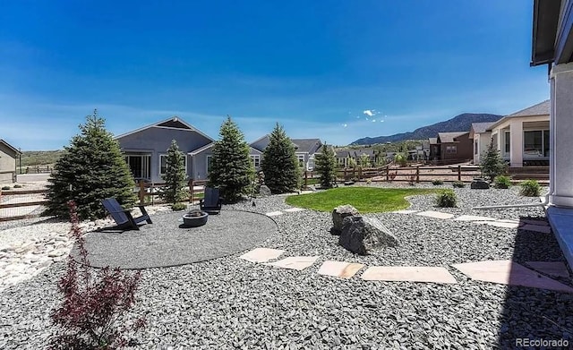 4465 Mesa Top Dr, Monument, CO 80132 - view of yard featuring a mountain view and a patio area