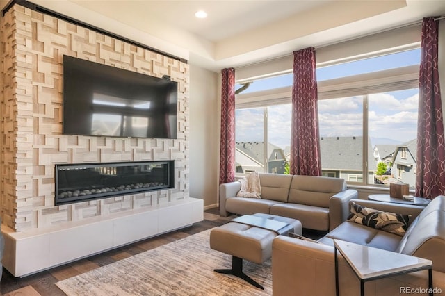 6362 Lythmore Grv, Colorado Springs, CO 80927 - living area with wood finished floors, a fireplace, and recessed lighting