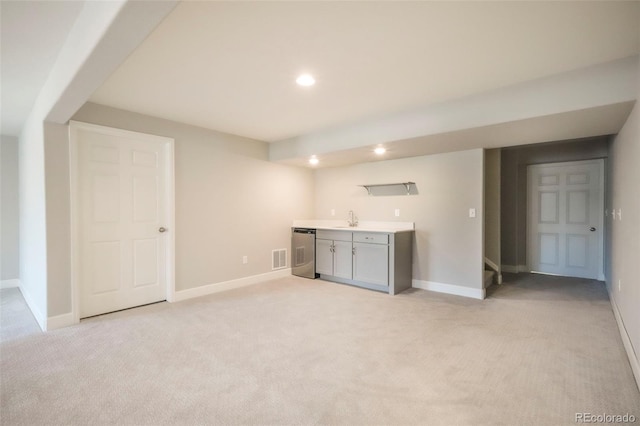 6362 Lythmore Grv, Colorado Springs, CO 80927 - kitchen featuring a sink, light carpet, recessed lighting, baseboards, and light countertops
