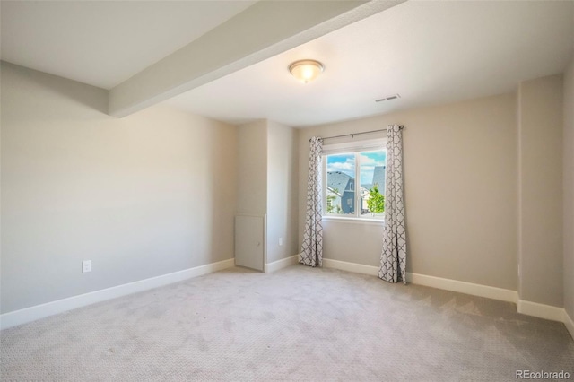 6362 Lythmore Grv, Colorado Springs, CO 80927 - carpeted empty room featuring baseboards and beam ceiling