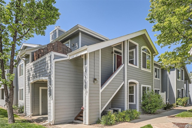 8500 E Jefferson Unit 3C, Denver, CO 80237 - view of front of house featuring a balcony and a chimney