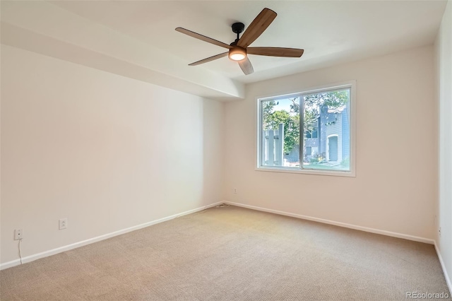 8500 E Jefferson Unit 3C, Denver, CO 80237 - empty room with light carpet, a ceiling fan, and baseboards