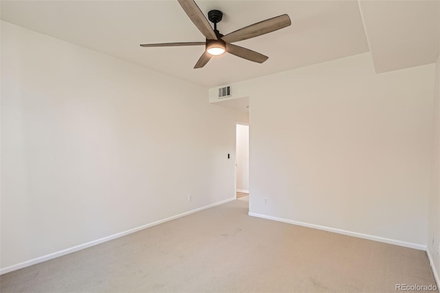 8500 E Jefferson Unit 3C, Denver, CO 80237 - spare room with a ceiling fan, baseboards, and light carpet