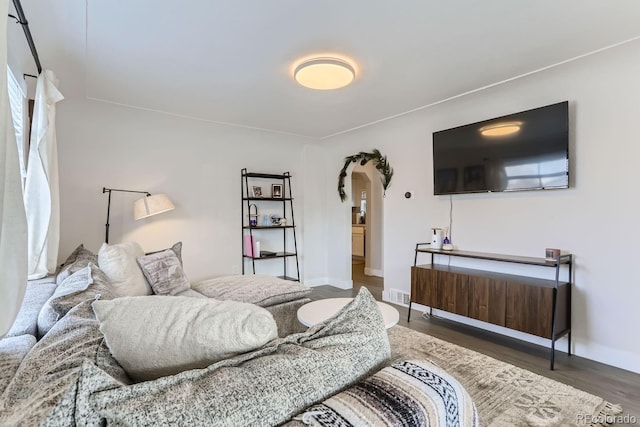 bedroom featuring dark hardwood / wood-style floors