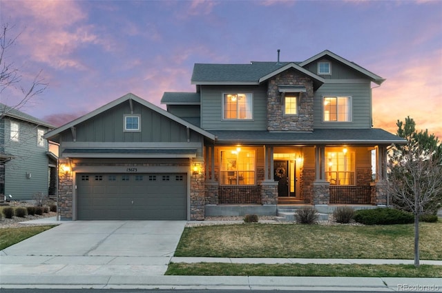 craftsman inspired home featuring board and batten siding and stone siding
