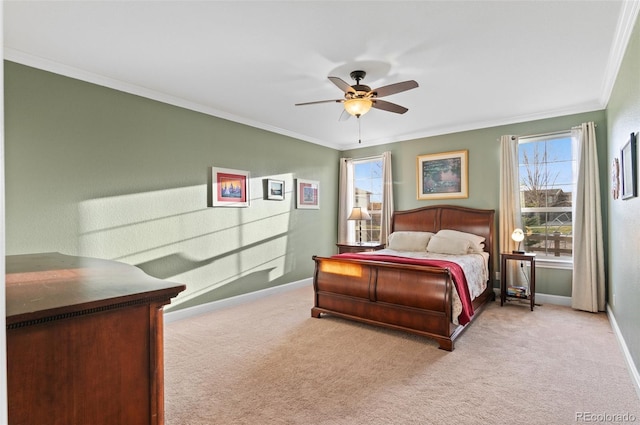 bedroom with crown molding, baseboards, multiple windows, and carpet floors