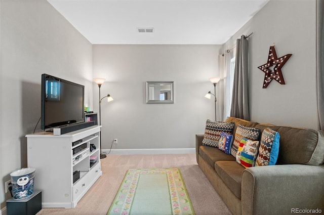 living room featuring light colored carpet, baseboards, and visible vents