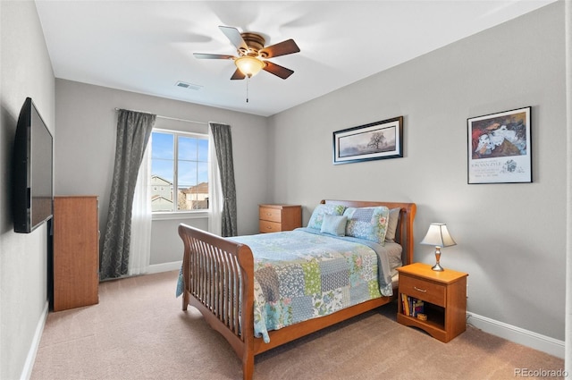 bedroom featuring ceiling fan, baseboards, carpet, and visible vents