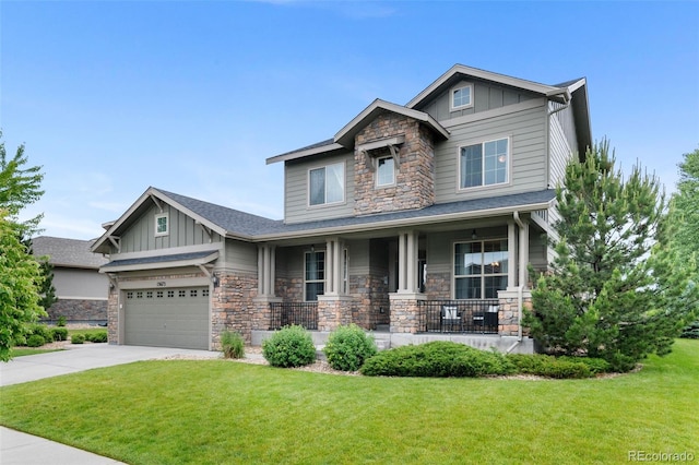 13673 Osage St, Broomfield, CO 80023 - craftsman inspired home with stone siding, a porch, board and batten siding, and a front yard