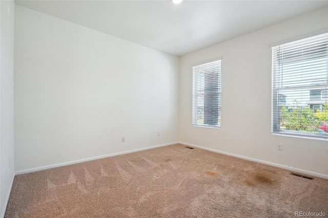 view of carpeted spare room