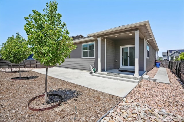 back of house featuring a patio