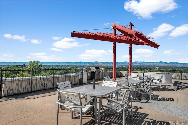 view of patio featuring a mountain view