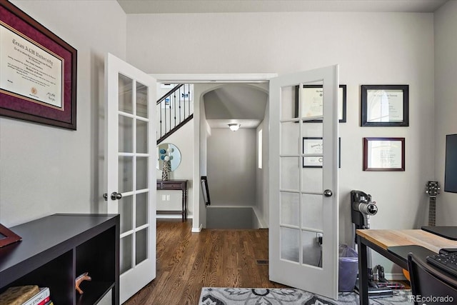 office space with french doors and wood finished floors