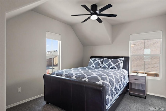 bedroom featuring baseboards, carpet, and vaulted ceiling