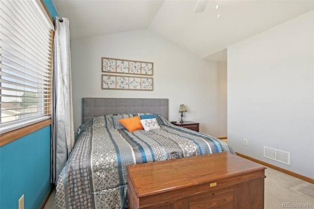 bedroom featuring carpet, a ceiling fan, baseboards, lofted ceiling, and visible vents