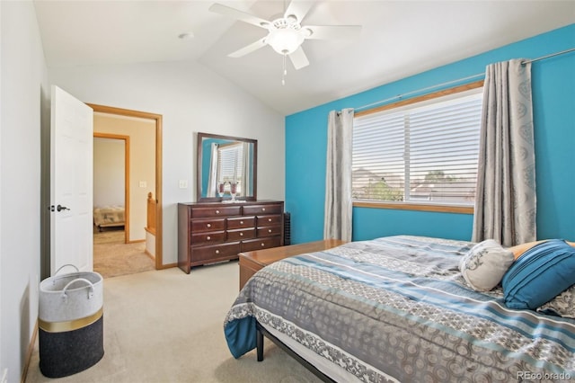 carpeted bedroom featuring baseboards, multiple windows, ceiling fan, and lofted ceiling