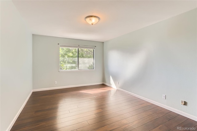 8635 Clay St Unit 417, Westminster, CO 80031 - empty room featuring dark wood finished floors and baseboards