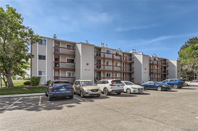 8635 Clay St Unit 417, Westminster, CO 80031 - view of apartment building / complex with uncovered parking