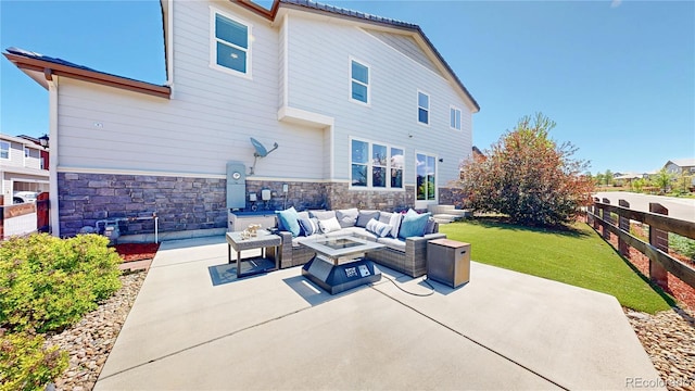 10016 Hough Pt, Parker, CO 80134 - view of patio / terrace featuring an outdoor living space with a fire pit